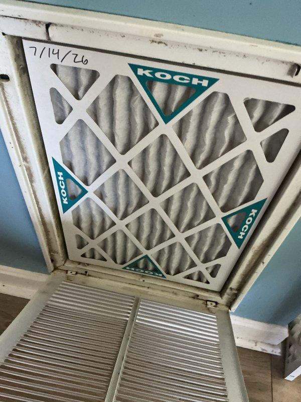 Completed annual cooling maintenance visit on residential HVAC system. Performed comprehensive inspection of outdoor condensing unit, noting significant dirt and debris accumulation on condenser coils requiring attention for optimal heat transfer efficiency. Replaced 14x20x1 air filter at return air grille with new Koch filter, documenting installation date. Conducted standard cooling system checks including refrigerant line inspection and visual assessment of unit components. System operational upon completion of maintenance procedures.