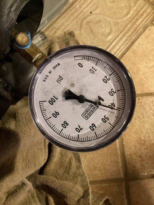 Installed loop conditioner on hydronic heating system. Tested and verified system pressure at 45-50 PSI using calibrated pressure gauge. Confirmed proper operation of all valves and fittings in the loop assembly. System now operating within manufacturer specifications.
