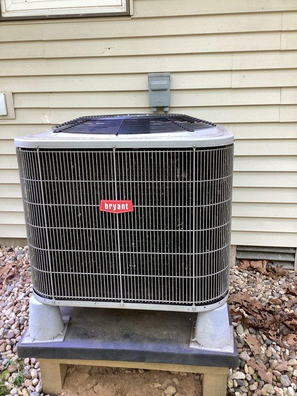 Responded to no cooling complaint on 11-year-old Bryant heat pump system that had recently received refrigerant recharge and leak seal treatment. Upon arrival, performed comprehensive system diagnostics and discovered refrigerant charge was critically low, indicating the previous leak seal repair had failed. Conducted thorough leak detection using electronic leak detector and identified active refrigerant leak at service port connection. Recovered remaining refrigerant from system per EPA regulations. Replaced faulty service port and pressure tested system to verify repair integrity. Evacuated system to proper vacuum levels and recharged with manufacturer-specified refrigerant to correct operating pressures. Verified proper system operation with all parameters within normal range. Inspected and confirmed 20x20x1 air filter was clean and properly installed. System restored to full cooling capacity with all components functioning as designed.