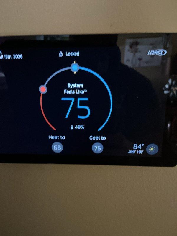 Completed annual cooling maintenance visit on residential HVAC system. Performed comprehensive inspection of outdoor Lennox condenser unit, verified proper operation of all components including compressor and condenser fan, checked refrigerant lines and electrical connections, and replaced air filter. Confirmed Lennox digital thermostat functioning correctly with system cooling to setpoint of 75°F, and documented all equipment operating within normal parameters.