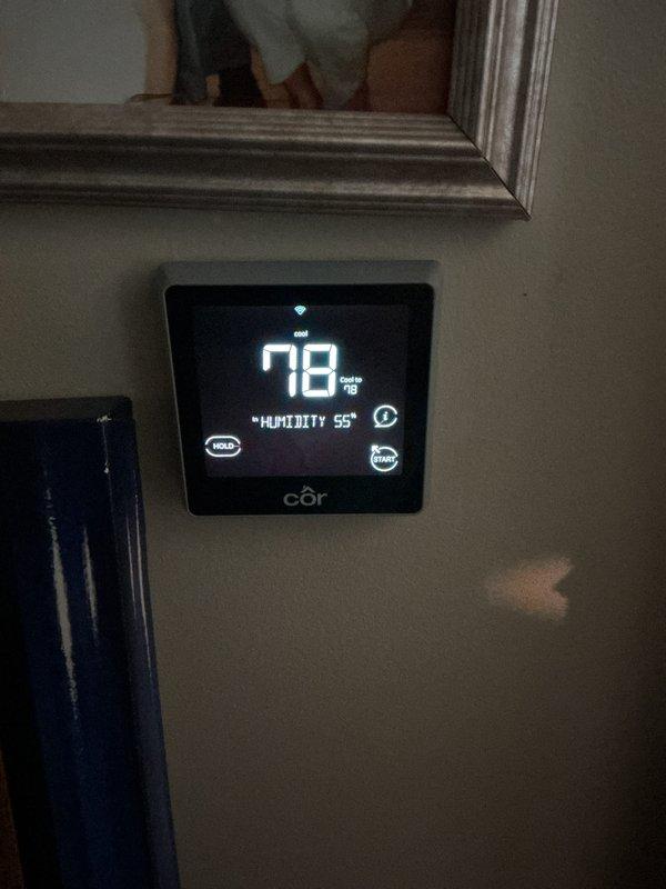 Completed annual basic cooling maintenance visit on residential HVAC system with Puron refrigerant (model CPWFP902TA). Performed standard preventive maintenance procedures including system inspection, verification of operating temperatures and pressures, and documentation of equipment specifications. Thermostat displaying 78°F with 55% humidity, system operating within normal parameters.