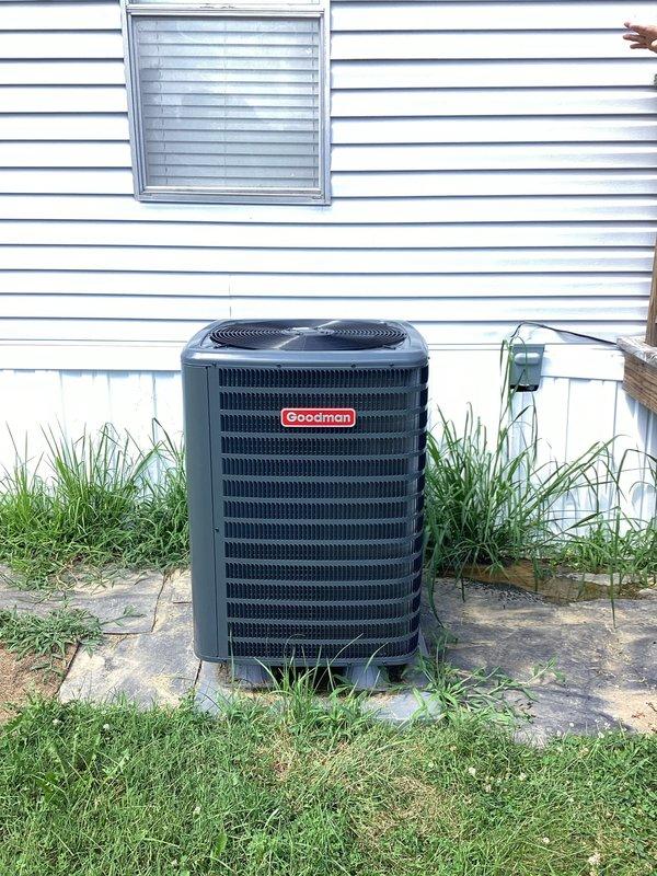 Responded to warranty callback for Goodman condensing unit vibrating off concrete pad following installation completed in May. Inspected unit positioning and pad placement, documented current condition with photos showing unit displacement and pad settling. Adjusted and repositioned unit on pad to restore proper placement and eliminate vibration issue.