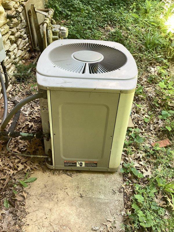 Responded to customer concern regarding suspected refrigerant leak in R22 air conditioning system. Upon arrival, inspected outdoor condenser unit and indoor thermostat controls. Customer requested system be recharged with R22 refrigerant to restore cooling capacity. Documented equipment condition and thermostat configuration with photos for service records.
