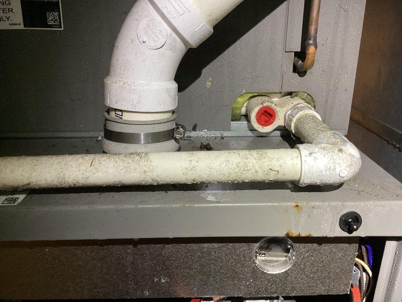 Responded to service call for air conditioning system malfunction. Upon arrival, performed diagnostic inspection of HVAC unit. Removed access panel and conducted thorough examination of internal components including gas valve assembly, control board, pressure switches, and electrical connections. Inspected condensate drain system and PVC piping configuration for proper operation and potential blockages. Verified all safety switches, wiring connections, and mechanical components for proper function. System evaluated and necessary repairs identified to restore normal operation.