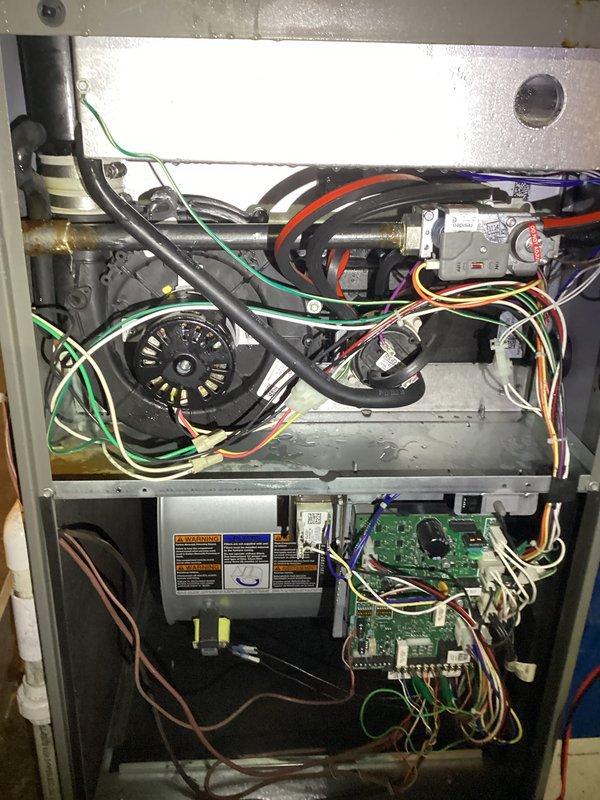 Responded to service call for air conditioning system malfunction. Upon arrival, performed diagnostic inspection of HVAC unit. Removed access panel and conducted thorough examination of internal components including gas valve assembly, control board, pressure switches, and electrical connections. Inspected condensate drain system and PVC piping configuration for proper operation and potential blockages. Verified all safety switches, wiring connections, and mechanical components for proper function. System evaluated and necessary repairs identified to restore normal operation.