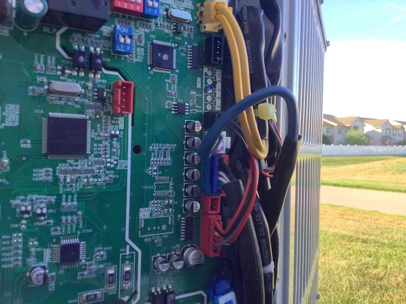 Responded to E6 error code on HVAC system. Diagnosed faulty inverter control board as the source of the fault code. Documented existing circuit board condition with photos showing PCB, capacitors, toroidal inductors, and heat sink assembly. Unit remains inoperable and unoccupied. Return visit scheduled to replace inverter board with spare unit from inventory to restore system operation.