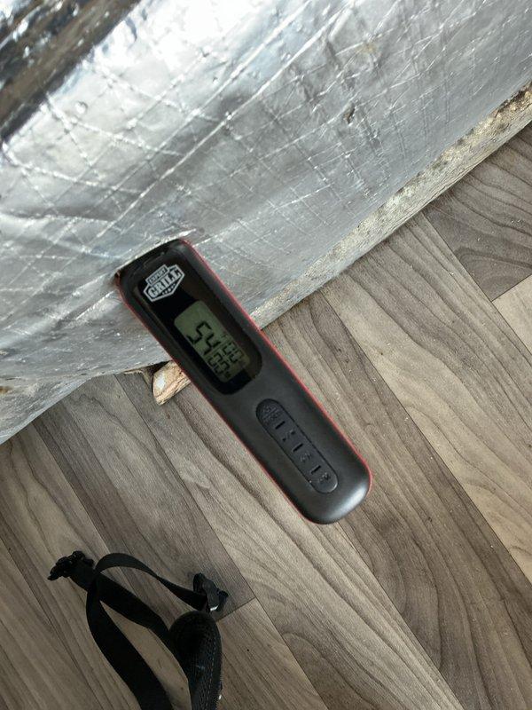 Completed cooling season tune-up maintenance on residential HVAC system. Performed standard inspection procedures including temperature differential measurements across the evaporator coil, recording supply air temperature of 54.95°F. Verified proper operation of air handler unit and inspected Nordic Pure 20x20x5 pleated air filtration system for adequate airflow and filter condition.