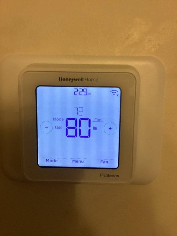 Replaced defective ECM blower motor control board on HVAC system. Verified proper system operation with thermostat calling for cooling mode and confirmed supply air temperature of 82.5°F at the unit, indicating successful repair and restored functionality.