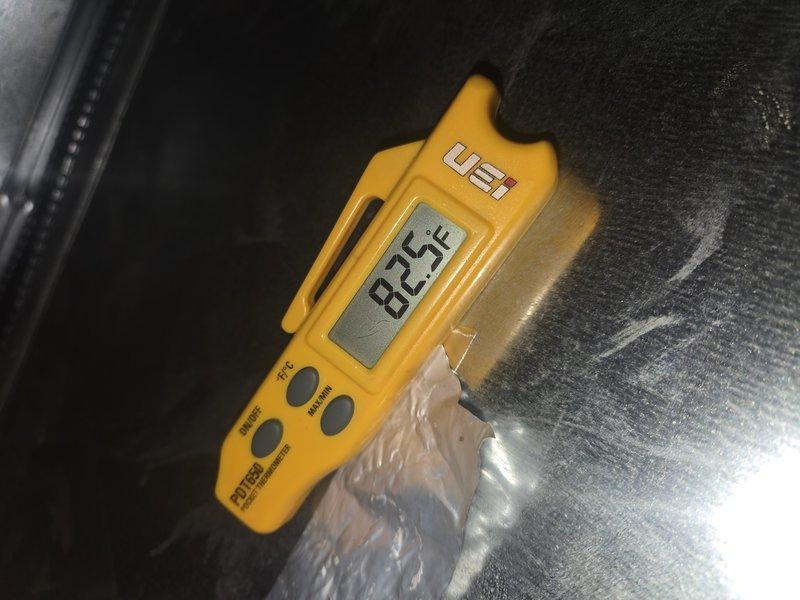 Replaced defective ECM blower motor control board on HVAC system. Verified proper system operation with thermostat calling for cooling mode and confirmed supply air temperature of 82.5°F at the unit, indicating successful repair and restored functionality.