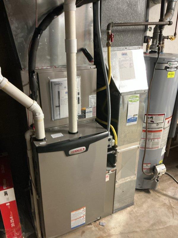 Completed annual basic cooling maintenance visit on Lennox HVAC system. Performed standard inspection of air handler unit, evaporator coil, and associated components. Evaporator coil fins were found to be in relatively clean condition with normal operational appearance. Inspected furnace, water heater, ductwork, and system connections including PVC venting, gas lines, and electrical components. All equipment appeared to be functioning within normal parameters. Customer expressed interest in obtaining estimate for ductwork modifications. Filter size 20x25x4 not included with service. System operational upon completion of maintenance visit.