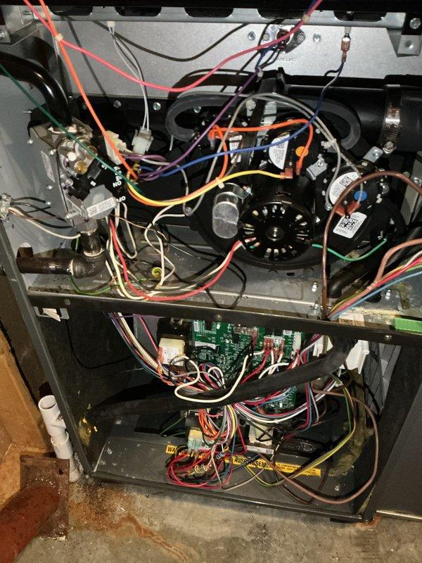 Completed comprehensive cooling season maintenance tune-up on single HVAC unit per maintenance plan agreement. Performed full system inspection including refrigerant pressure and temperature diagnostics, verified all electrical connections and control board operation, inspected blower motor assembly and gas valve components, and documented equipment condition with thermal readings showing -6.9°F measurement. All components found operating within normal parameters with routine wear consistent with system age.