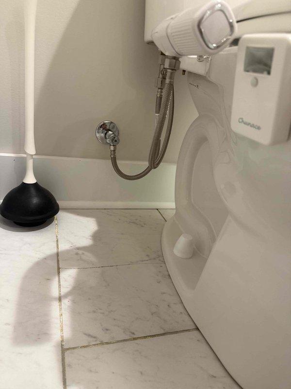 Responded to service call for toilet wax ring failure. Upon inspection, found severely corroded and deteriorated toilet flange rings requiring immediate replacement. Removed toilet from floor, extracted failed wax ring and damaged flange components. Installed new wax ring and reconnected toilet to water supply line, ensuring proper seal and stable mounting. Verified flush operation and checked for leaks at base and supply connection.