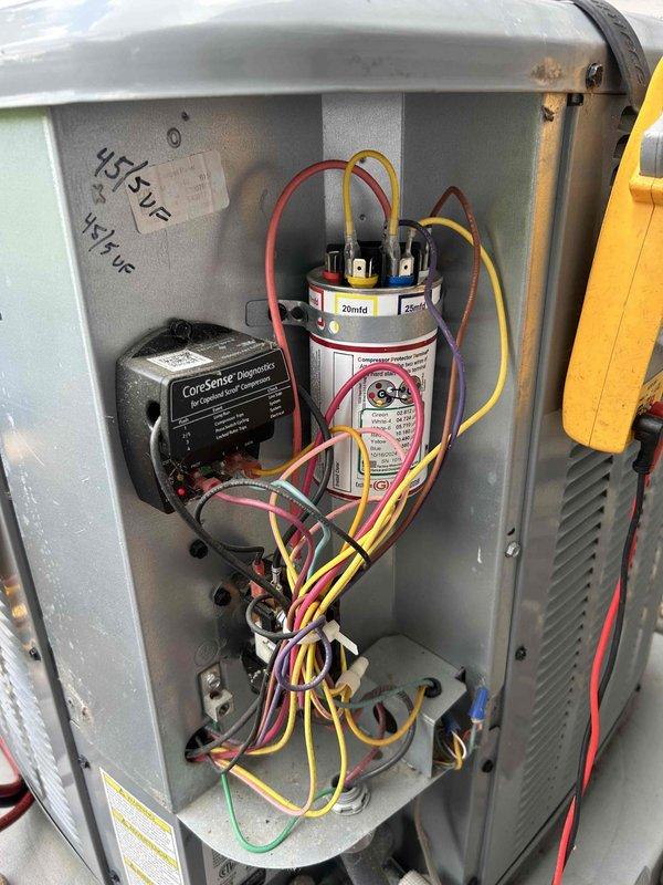 Responded to service call for air conditioning unit blowing hot air. Performed diagnostic evaluation of HVAC system using CoreSense diagnostics module and multimeter to assess electrical components, capacitor function, and thermostat operation. Verified thermostat was set to cooling mode at 88 degrees and confirmed system operational status after troubleshooting electrical connections and capacitor terminals.