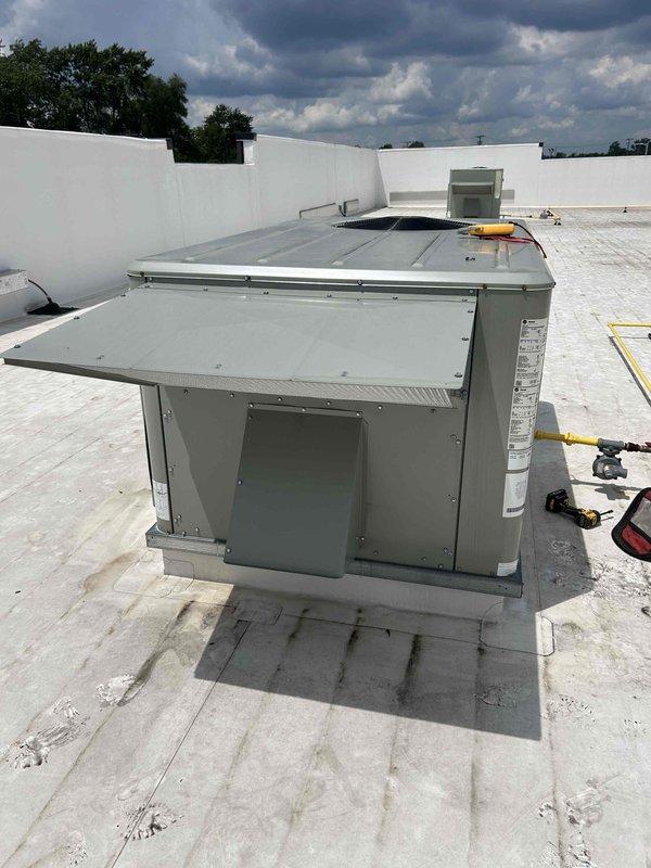 Responded to complaint of intermittent cooling with unit blowing warm air. Inspected commercial rooftop packaged unit and verified customer concern. Diagnosed and resolved issue causing inconsistent cooling operation, restoring system to proper function with cold air discharge.