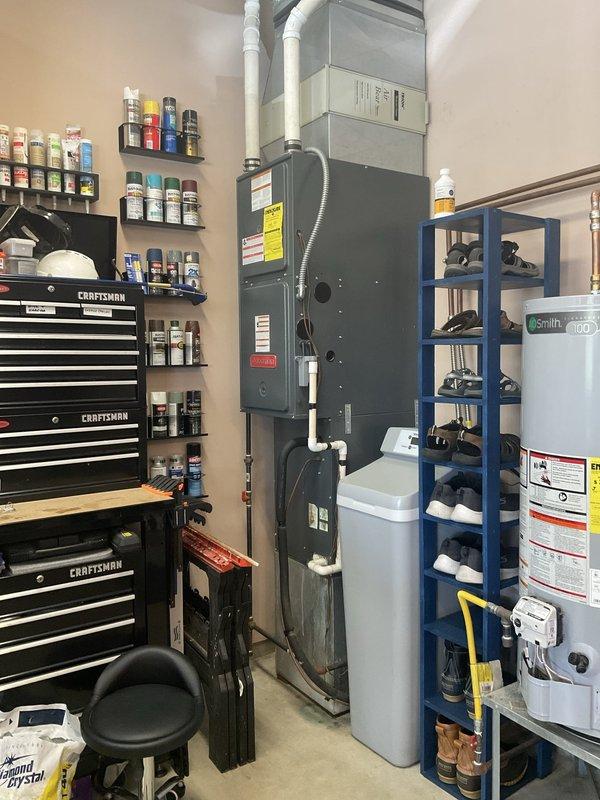 Conducted comprehensive Home Comfort Evaluation of existing HVAC system, including indoor furnace unit located in mechanical room and outdoor air conditioning condenser positioned on exterior concrete pad. Documented current equipment condition, specifications, and system performance through detailed photography and assessment to provide customer with replacement options and recommendations for upgraded heating and cooling equipment.