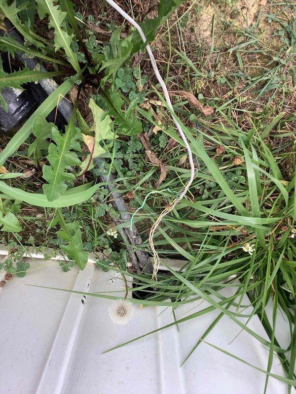 Responded to service call for residential AC unit experiencing intermittent operation and sparking issues. Upon arrival, performed diagnostic evaluation of outdoor condensing unit and electrical components. System exhibited failure to maintain continuous operation, with unit starting but shutting down shortly after. Inspected electrical connections at disconnect box and conduit runs, checking for loose wiring or damaged components that could cause arcing. Evaluated compressor operation and electrical draw to determine potential compressor failure as reported concern. Documented unit condition and installation location adjacent to metal structure with photographic evidence for service records.