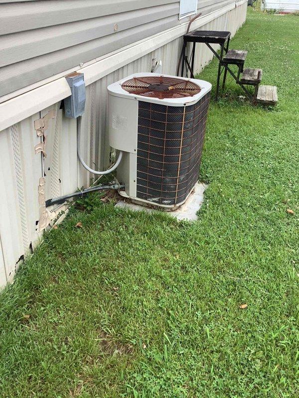Performed routine maintenance and inspection on residential outdoor condensing unit. Verified proper operation of condenser fan motor, checked refrigerant levels, and inspected electrical connections. Confirmed condensate drain line functionality and cleared any debris from unit exterior. System operating within normal parameters upon completion.