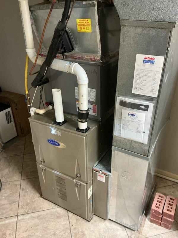 Completed basic monthly cooling maintenance visit on Carrier HVAC system. Performed standard inspection of air handler and cooling components, verified proper operation of all equipment, and checked refrigerant lines and electrical connections. Customer-supplied 20x25x4 Honeywell filter (MERV-rated, model FC40R1037) was photographed on-site but not installed per service agreement specifications.