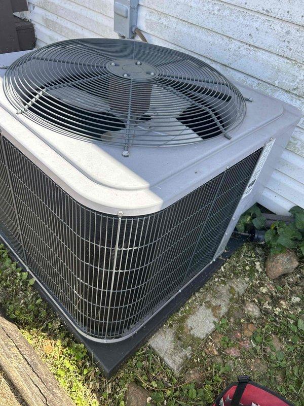 Responded to no cooling complaint on 10+ year old residential air conditioning system. Performed electrical diagnostics on outdoor condenser unit using digital multimeter and clamp meter. Tested capacitor functionality and measured voltage/amperage at compressor and fan motor connections. Evaluated overall system performance and provided recommendations for aging equipment. Unit operational upon departure.