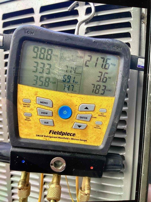 Responded to callback for inadequate cooling during high ambient temperatures. Performed comprehensive system diagnostics using refrigerant manifold gauge to measure operating pressures and temperatures across both low and high side of the system. Verified system performance parameters and documented readings to assess cooling capacity under load conditions.