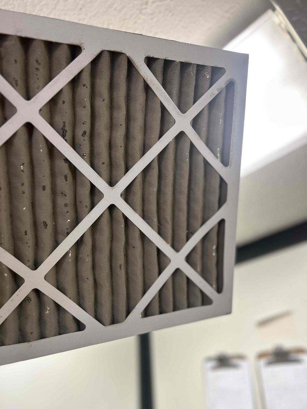 Responded to no cooling complaint and performed complete system diagnostic. Inspected outdoor condensing unit and found heavily soiled air filter restricting airflow to system. Replaced dirty filter with new pleated filter, restoring proper airflow and system operation. Unit tested and confirmed cooling properly upon departure.