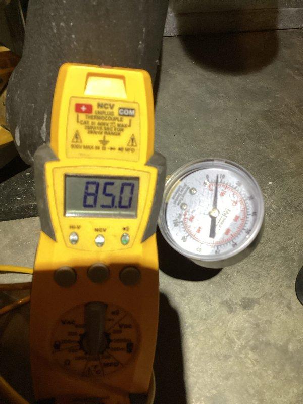 Completed basic monthly cooling maintenance on two HVAC systems. Performed standard inspections including temperature verification at thermostat showing 70°F set point in auto mode, and measured system performance parameters with digital multimeter reading 850 and analog pressure gauge indicating proper refrigerant levels within normal operating range. Both systems operating efficiently with no issues identified during routine service visit.