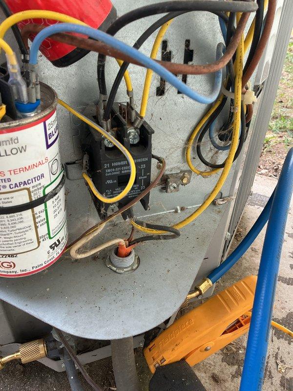 # HVAC Maintenance - Cooling System Service

Completed comprehensive monthly maintenance service on residential cooling system. Performed thorough inspection of outdoor condenser unit, noting moderate dirt and debris accumulation on upper coil surfaces. Cleaned condenser coils to restore optimal heat transfer efficiency and airflow through heat exchanger fins.

Inspected electrical components including run capacitor, contactor, and all wire connections for proper operation and secure termination. Verified capacitor specifications and tested for proper microfarad readings within manufacturer tolerances. Checked contactor points for wear and pitting, confirming adequate electrical contact.

Connected refrigerant manifold gauge set to service ports and recorded system pressures. Evaluated refrigerant charge levels and system performance parameters. Verified proper operation of compressor and fan motor. Inspected refrigerant lines for signs of leakage, damage, or insulation deterioration.
