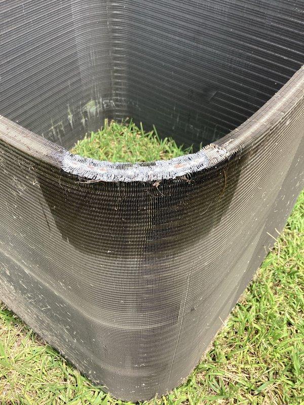 Performed condenser coil repair on outdoor air conditioning unit. Inspected refrigerant line set connections at condenser base and verified proper insulation on refrigerant lines. Unit operational upon completion with all connections secure and system functioning as designed.