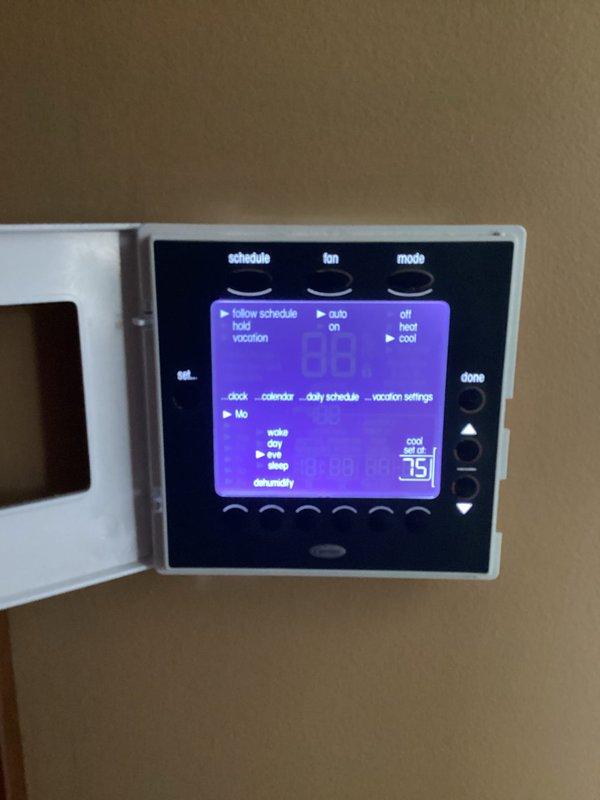 Responded to no cooling call with ice formation on system. Found frozen evaporator coil on Carrier unit. Verified blower operation normal. Diagnosed restricted airflow as cause of freezing condition. Allowed system to thaw completely, replaced dirty air filter, and confirmed proper airflow restoration. Checked thermostat programming and temperature settings. System tested and operating within normal parameters upon departure.