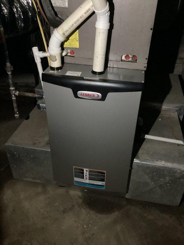 Completed complimentary maintenance tune-up on Lennox furnace and R-410A heat pump system. Performed standard inspection procedures, documented system specifications and refrigerant type, and captured equipment condition photos for service records. Customer requested separate quote for duct cleaning services to be provided.