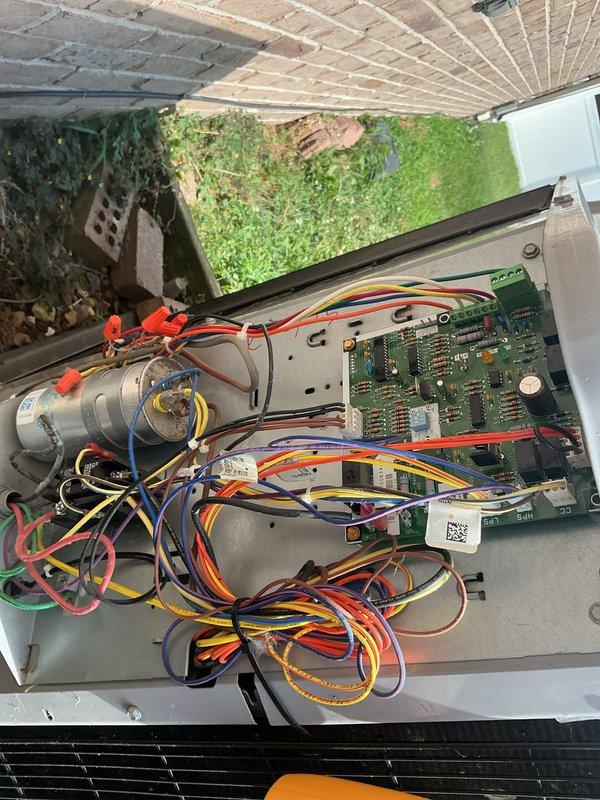 Completed annual Comfort Care maintenance on residential cooling system, including comprehensive inspection of control unit electronics and circuit boards. Verified thermostat operation at 71°F set point with 54% humidity reading and confirmed system holding temperature at 69°F. Inspected washable filter and advised customer to clean per maintenance schedule.