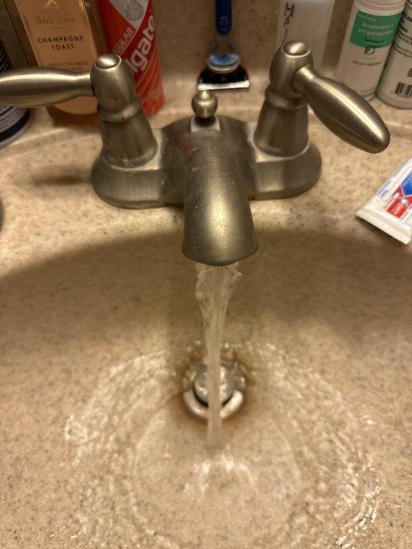 Completed monthly prepaid plumbing inspection of residential property. Evaluated existing plumbing fixtures including toilet and bathroom sink with dual-handle faucet, both in proper working condition. Discussed water softener options with homeowner, providing technical information on salt-based versus salt-free water conditioning systems to support their decision-making process for future installation.