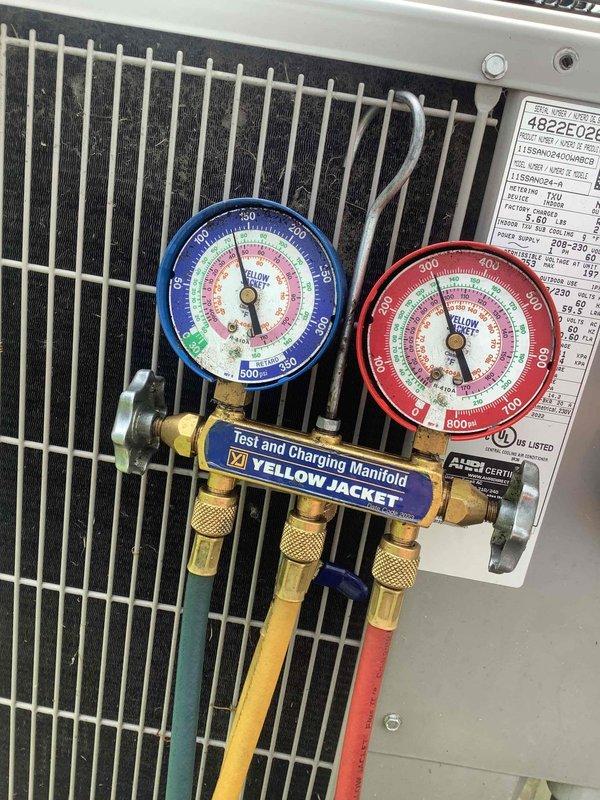 Responded to frozen evaporator coil issue on Bryant system currently under manufacturer warranty. Unit had frozen up prior to arrival; customer had already shut system down and allowed complete thaw cycle before restart. Connected manifold gauges to condenser unit and performed diagnostic testing to determine root cause of freeze-up, checking refrigerant pressures, airflow across coil, and system operation parameters.