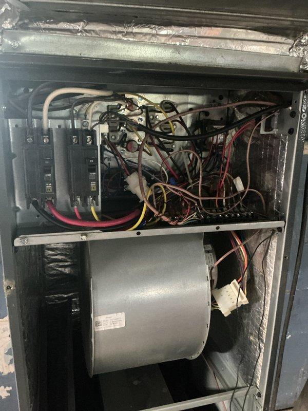 Performed routine cooling system maintenance on 9-year-old HVAC unit. Inspected air handler components including blower motor assembly, electrical connections, and control panel; verified all wiring secure and circuit breakers functioning properly. Examined evaporator coil for cleanliness and proper operation, confirmed system running smoothly with no issues identified.