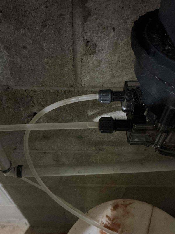# Sump Pump Replacement

Replaced failed sump pump unit in basement utility area. Removed old pump assembly from pit and installed new pump with check valve and discharge piping. Verified proper float operation and tested pump cycle to ensure adequate drainage function. System operational and draining effectively.