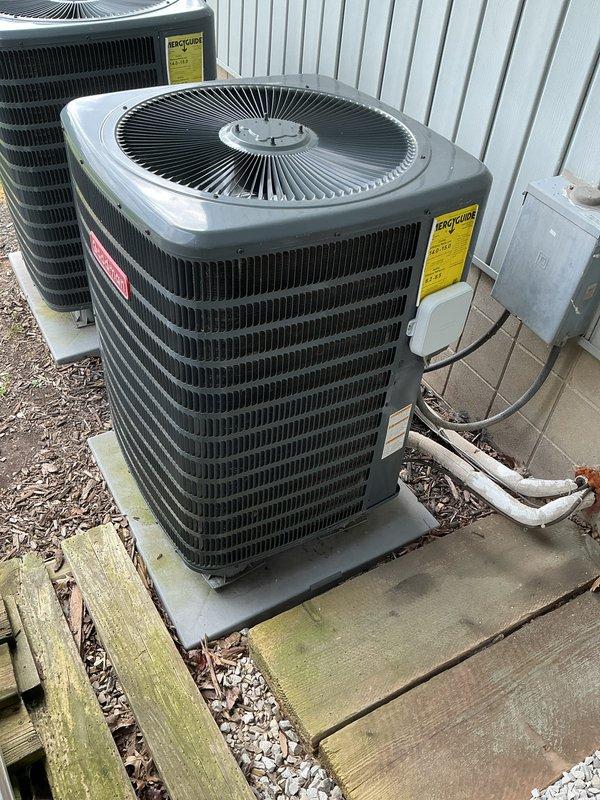 Completed annual cooling maintenance on two HVAC systems at residential property. Performed comprehensive inspections of both outdoor condenser units, checking refrigerant levels, electrical connections, and compressor operation. Verified proper airflow across condenser coils, inspected fan motor operation, and tested electrical disconnect boxes. Inside, evaluated Honeywell Home ProSeries thermostat functionality, confirming accurate temperature readings and proper communication with both systems. Checked thermostat settings showing cooling mode at 78°F with setpoint of 73°F and fan set to auto operation. Inspected refrigerant line sets and verified proper insulation on both systems. All equipment operating within normal parameters with no deficiencies noted. Both systems cooling effectively and ready for continued seasonal operation.