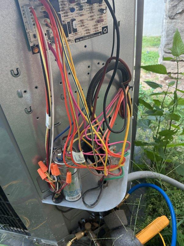 Performed commercial HVAC maintenance agreement service on recently installed system. Verified system operation with supply air temperature reading of 59.88°F at floor register. Inspected outdoor unit electrical control panel, checked wiring connections and circuit board components, and replaced air filter as part of preventative maintenance agreement.