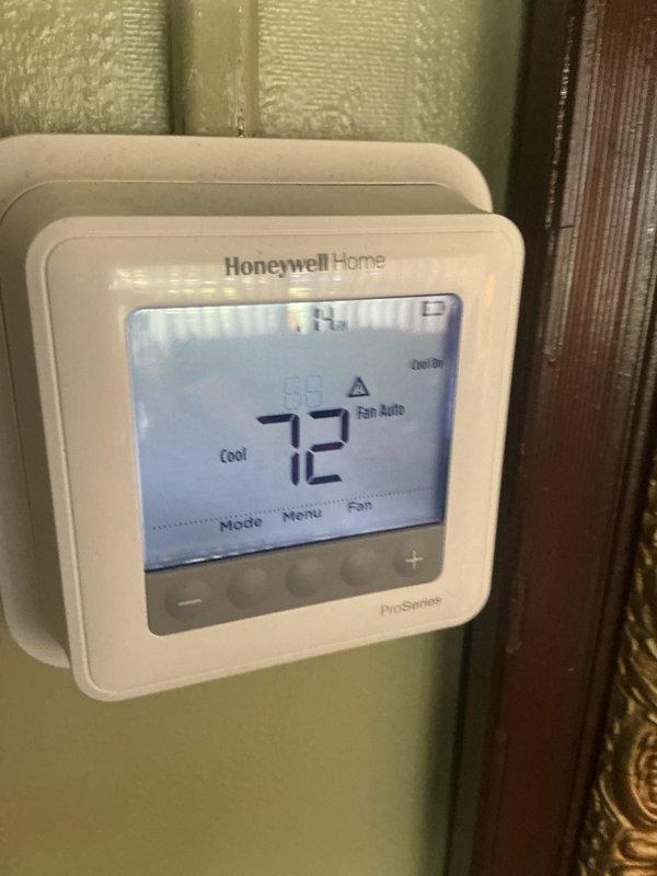 Completed Basic Cooling Visit - Monthly recurring maintenance service on residential HVAC system. Performed standard inspection of air handler unit and verified thermostat operation showing 72°F in cooling mode with fan set to auto. All equipment operating within normal parameters at time of service.
