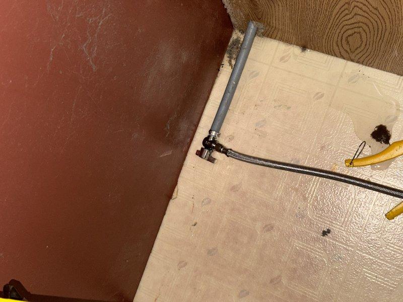 Responded to water leak complaint involving newly installed appliances. Inspected shut-off valves serving dishwasher and supply line behind refrigerator, both exhibiting active leaks. Documented conditions via photography showing braided supply line connections and valve assemblies in cabinet access area. Provided estimate for replacement of faulty shut-off valves and refrigerator supply line to resolve leakage issues.