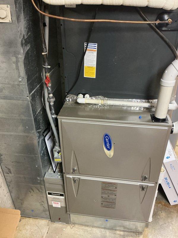 Completed comprehensive cooling maintenance service on residential Carrier HVAC system. Performed standard CCC protocol including system inspection, operational testing, and component evaluation. Inspected evaporator coil and noted moderate to heavy dust and debris accumulation between fins, which can impact airflow efficiency and system performance. Checked refrigerant lines, condensate drainage system, and all visible connections. Verified furnace and air handler components for proper operation. Customer was advised that 20x25x4 filter was not included in this service visit and should be replaced as needed for optimal system performance.