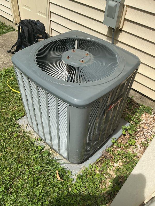 Completed comprehensive cooling system tune-up on outdoor condensing unit. Performed standard preventive maintenance including inspection of electrical connections, contactor assembly, and refrigerant lines. Noted visible corrosion on terminal block connections and rust formation on fan guard mounting area; documented equipment condition with photos for customer records.