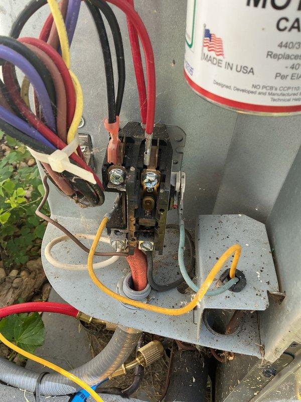 Completed comprehensive cooling system tune-up on outdoor condensing unit. Performed standard preventive maintenance including inspection of electrical connections, contactor assembly, and refrigerant lines. Noted visible corrosion on terminal block connections and rust formation on fan guard mounting area; documented equipment condition with photos for customer records.