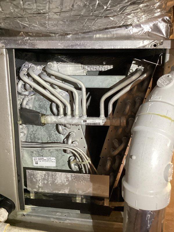 Completed Basic Cooling Visit monthly maintenance service on residential HVAC system. Performed standard cooling system inspection, accessing interior components through main service panel to verify proper operation of heat exchanger coils and condensate drainage system. Installed new 20x25x4 air filter per CCC maintenance agreement specifications. Inspected evaporator coil assembly, drain pan, and PVC condensate drain line for proper function and drainage. Verified thermostat operation with unit holding at 73°F cooling setpoint as programmed. All system components found operating within normal parameters with no deficiencies noted.