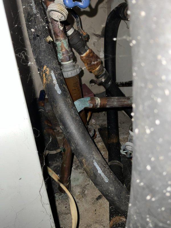 Conducted on-site assessment of aging geothermal HVAC system following recent capacitor replacement due to no cooling condition. Evaluated existing Nagel brand vertical ground-source heat pump unit installed in basement utility area, including associated air handler, ductwork distribution system, and ground loop plumbing connections. Documented current system configuration showing signs of age and wear, including corroded copper piping, oxidized metal components, and deteriorated plumbing connections throughout the geothermal loop system. Provided comprehensive replacement estimate for complete geothermal system upgrade to address customer's request for pricing on new equipment installation.