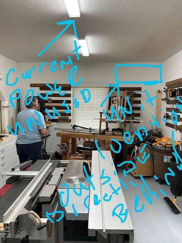 Conducted on-site evaluation for mini split installation in converted residential workshop space. Assessed room layout, electrical requirements, and optimal placement for indoor and outdoor units to provide climate control for active woodworking area with existing tool storage systems and equipment.