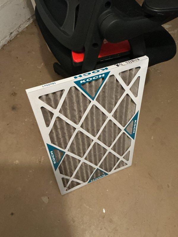 Completed Basic Cooling Visit as part of monthly recurring maintenance service. Replaced 16x25x1 air filter with new KOCH brand filter to maintain proper airflow and system efficiency. Performed standard cooling system inspection and documented equipment condition with photos of filter replacement and mechanical room setup including Rheem water heater and HVAC components.