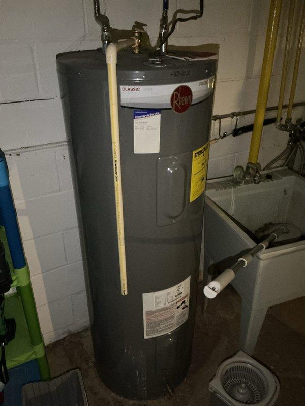 Completed Basic Cooling Visit as part of monthly recurring maintenance service. Replaced 16x25x1 air filter with new KOCH brand filter to maintain proper airflow and system efficiency. Performed standard cooling system inspection and documented equipment condition with photos of filter replacement and mechanical room setup including Rheem water heater and HVAC components.