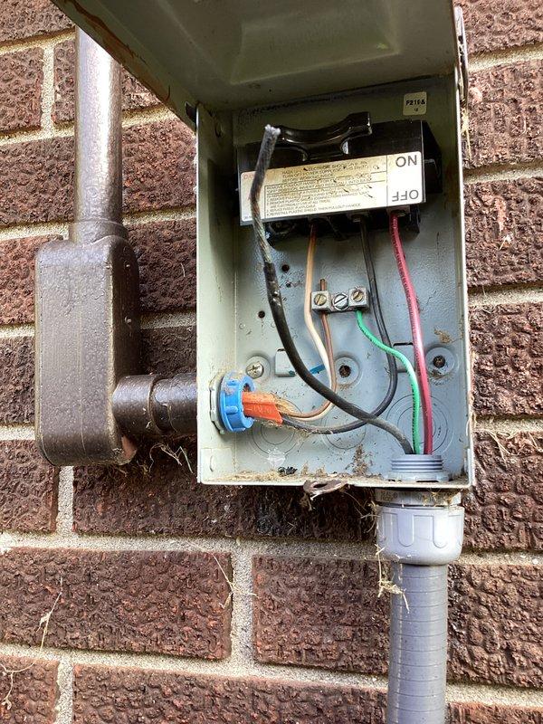 Responded to no cooling complaint on commercial Lennox system. Found unit not operating due to tripped disconnect switch at exterior electrical box. Inspected disconnect components and wiring connections, which appeared intact with no signs of electrical damage or loose connections. Reset disconnect switch to ON position and verified system operation. Thermostat display confirmed unit returned to normal cooling mode, actively cooling to setpoint of 72°F with system running properly. Advised monitoring system performance and checking for any recurring issues that may indicate underlying electrical problems.
