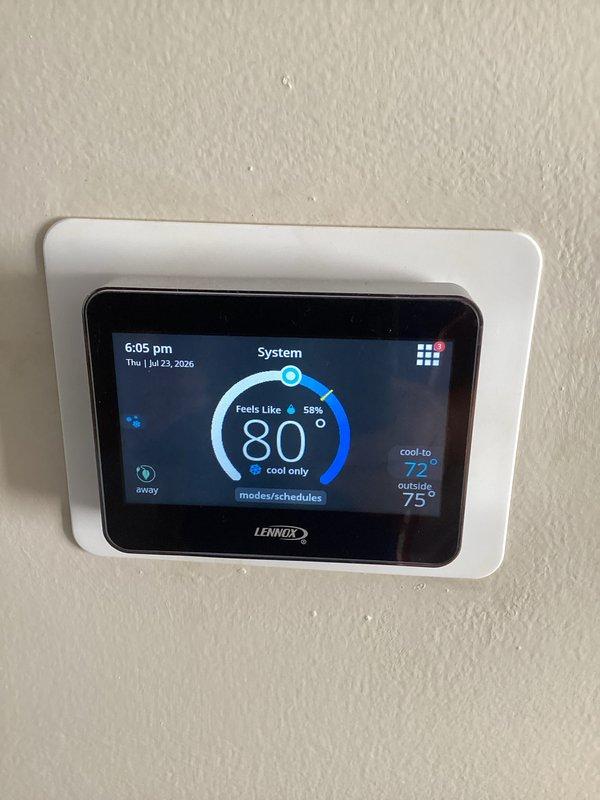 Responded to no cooling complaint on commercial Lennox system. Found unit not operating due to tripped disconnect switch at exterior electrical box. Inspected disconnect components and wiring connections, which appeared intact with no signs of electrical damage or loose connections. Reset disconnect switch to ON position and verified system operation. Thermostat display confirmed unit returned to normal cooling mode, actively cooling to setpoint of 72°F with system running properly. Advised monitoring system performance and checking for any recurring issues that may indicate underlying electrical problems.