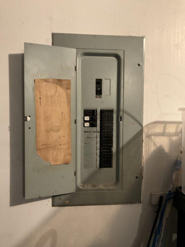 Conducted on-site evaluation for cooling system and dehumidifier installation in residential property. Assessed existing HVAC infrastructure including furnace unit and water heater configuration in basement utility area, documented electrical panel capacity and circuit availability, and captured detailed photographs of equipment layout to prepare comprehensive estimate for indoor air quality improvements.